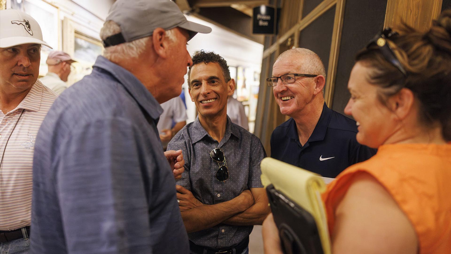 group of people in sales pavilion
