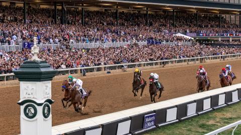 Horses crossing the finish line in the Breeders' Cup Classic 2022