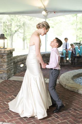 bride dancing with stepson